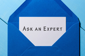 Blue Envelope with letter and note ASK AN EXPERT