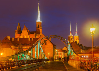 old town of Wroclaw - bridge to island Tumski at night, Poland