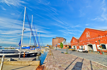 Naklejka premium View of the red brick warehouses at the Hakodate port in Hakodate, Hokkaido, Japan