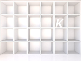 Empty white shelves with K