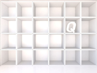 Empty white shelves with Q