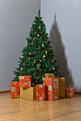 Christmas tree with gifts in colourful boxes