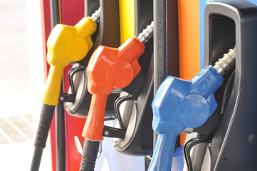 Gas pump nozzles in a service station, selective focus