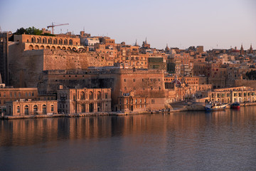 Fototapeta premium The view of fire accident in the Marsaxlokk fishing village, Malta