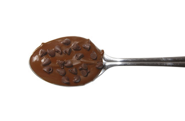 chocolate chips and chocolate spoon. party dessert. hot milk chocolate spoon with chocolate morsels. isolated on a white background. top view, flat lay. 