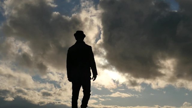 Going man throwing a documents slow motion silhouette
