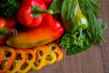 Sliced peppers on a brown table