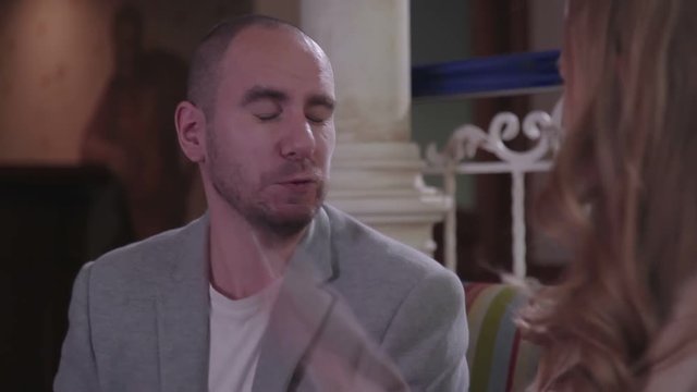 A woman puts a slap in the man's face