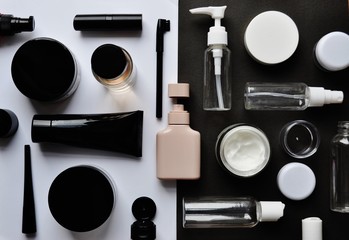 cosmetics on the black and white table
