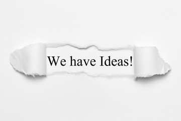 Fototapeta premium We have Ideas! on white torn paper