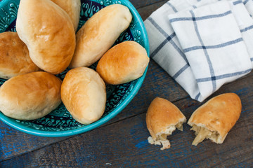 warm Russian pies with different fillings: meat, cabbage and apples. delicious with tea.