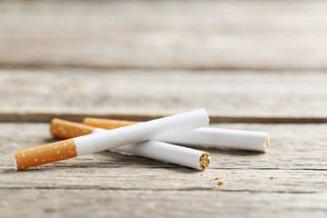 Tobacco cigarettes on a grey wooden table