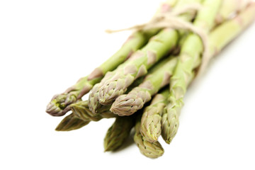 Fresh green asparagus isolated on a white