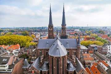 Fototapeten The view of gothic cathedral in Delft, Holland © alexkazachok