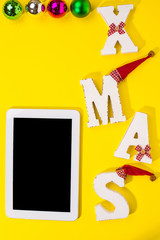 Smartphone with Christmas decorations.