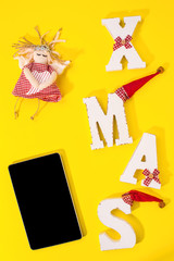 Smartphone with Christmas decorations.