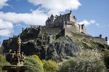 Fototapeta na wymiar Edinburgh city historic Castle Rock sunny Day ross fountain
