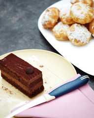 Chocolate cake and eclairs