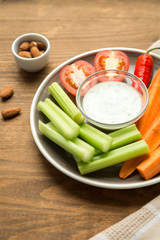Vegetarian healthy snacks, vegetable snack: carrots, celery, tom