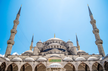 Fototapeta na wymiar The Sultan Ahmet Mosque (Blue Mosque) close up front view from the courtyard in Istanbul, Turkey