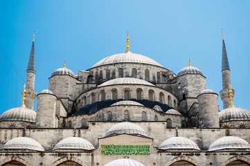 Fototapeta na wymiar The Sultan Ahmet Mosque (Blue Mosque) close up front view from the courtyard in Istanbul, Turkey