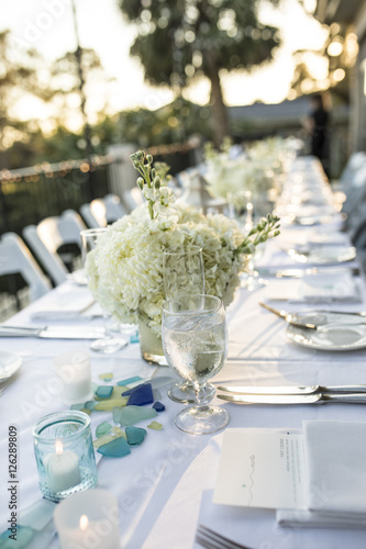 Table Set Up For Outdoor Sunset Reception Stock Photo And Royalty Table Set Up For Outdoor Sunset Reception