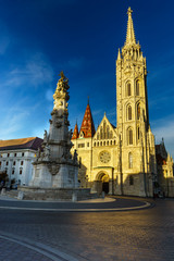Fototapeta na wymiar Matthias church and Statue of Holy Trinity in Budapest, Hungary