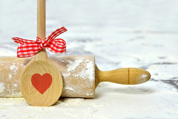 Mothers Day cooking. Wooden spoon and rolling-pin