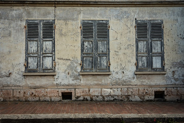 Distressed shutters in the medieval walled town of Provins, France