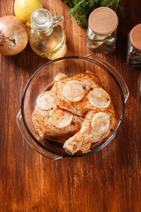 Raw chicken legs marinated