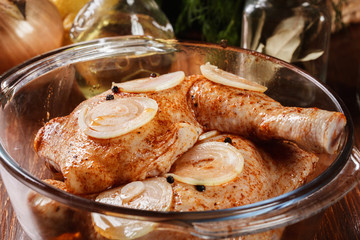 Raw chicken legs marinated