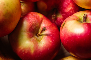 several red apples lying next to each other