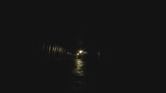 A deep tunnel inside a dark coal mine at glace bay