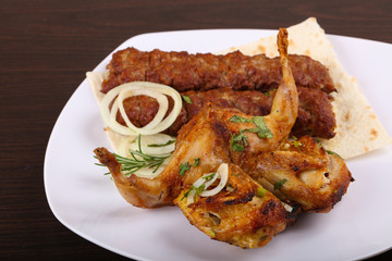 Beef kebab and grilled Quail