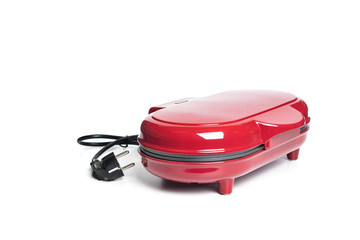 Red sandwich maker on white background