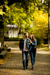 Couple walking in the autumn park
