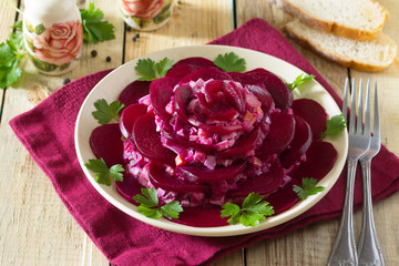Festive salad an appetizer in the form of rose (from beetroot, e