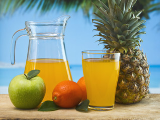 orange juice in a glass on a table