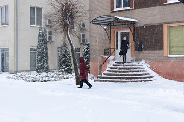 Fototapeta premium Snowfall in the city streets