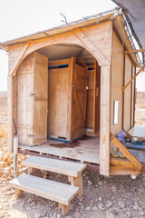 Wooden bathroom shower eco mobile tourism travel facility.