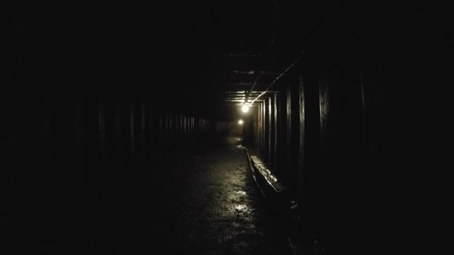 A deep tunnel inside dark coal mine at glace bay