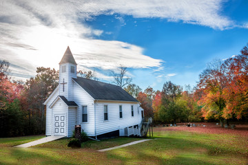 Small Wooden Church in the countryside during Autumn