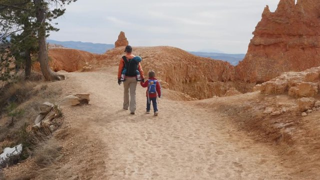 Family walking on a trail in Bryce Canyon National Park