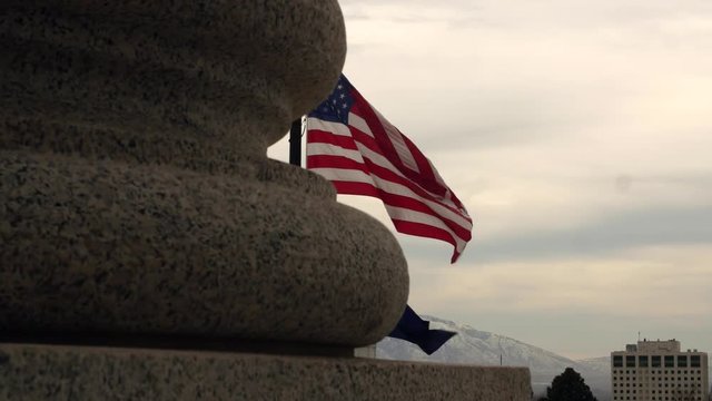 Flags flying at half mast at the Utah State Capitol Building in Salt Lake City Utah