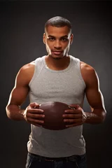 Foto op Canvas Determined afro-american football player © nyul