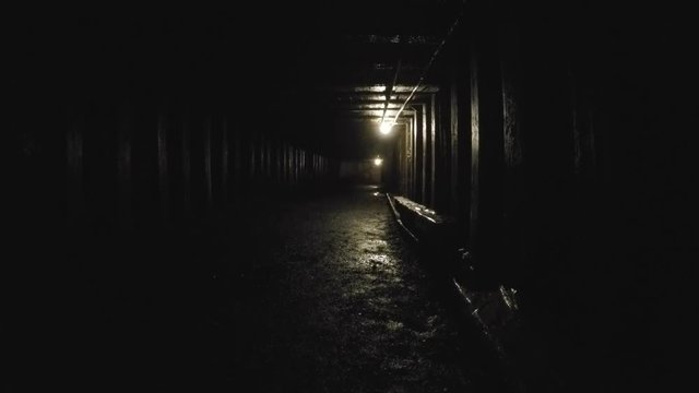Deep tunnel inside a dark coal mine at glace bay
