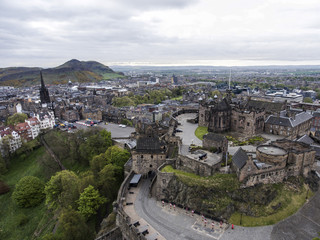 Edinburgh city historic Castle on Rock cloudy Day Aerial shot 2