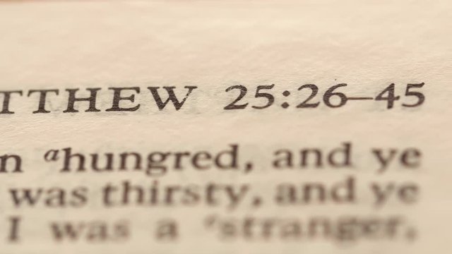 Closeup dolly shot of the pages of the bible