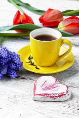 tea and bunch of tulips