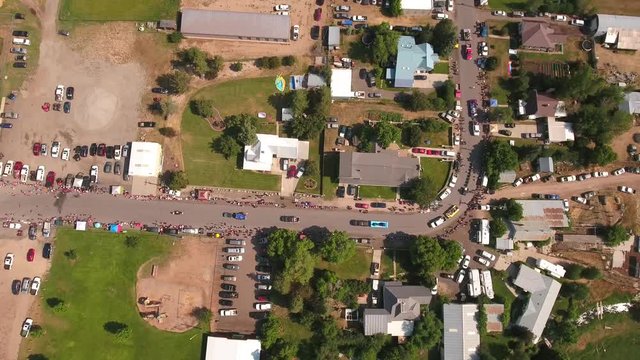 Aerial travelling shot of families watching the july 4th parade